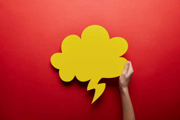 top view of empty yellow thought bubble on red background - Photo, Image