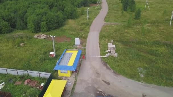 Top view of checkpoint. Clip. Truck at check point is waiting for inspection of transported goods. Checkpoint in forest area - Footage, Video