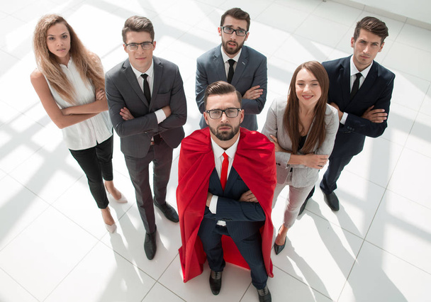 top view.businessman-Superman and his business team standing together - Fotó, kép