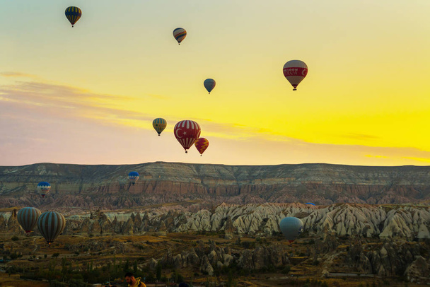 The great tourist attraction of Cappadocia - balloon flight. Cappadocia is known around the world as one of the best places to fly with hot air balloons. Goreme, Cappadocia, Turkey. - Photo, Image
