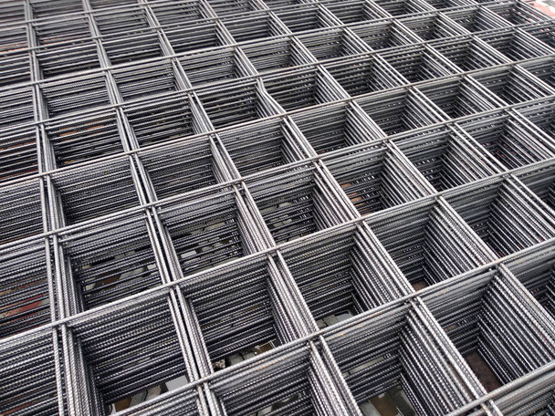 BRC welded wire mesh or BRC fabric used as part of the main structural component in floor slab structure element in the construction site. Comes in various size depend on design.   - Photo, Image