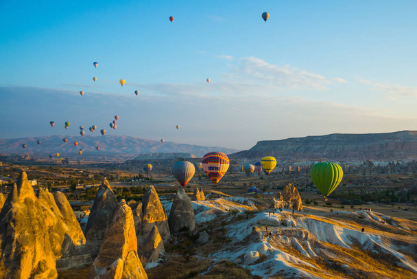 The great tourist attraction of Cappadocia - balloon flight. Cappadocia is known around the world as one of the best places to fly with hot air balloons. Goreme, Anatolia, Turkey. - Фото, изображение