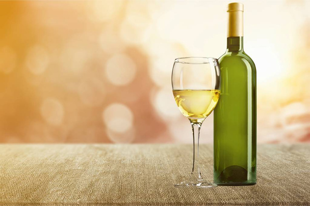 white wine in wineglasses and bottle, closeup - Foto, Imagem