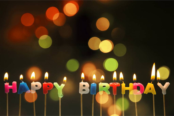 Birthday candles on blurred background - Zdjęcie, obraz