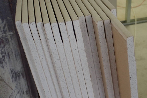 many gypsum boards prepared on a building site  to be installed - Photo, Image