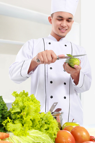 male chef preparing some food - Foto, Imagem