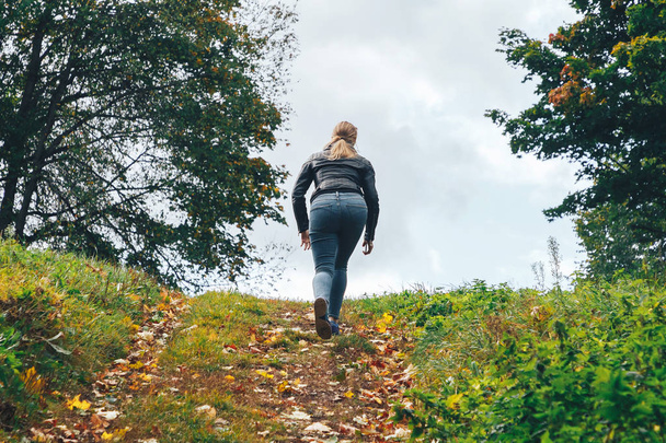 September, 29, 2018 - Minsk, Belarus: Quest on sights of Belarus, woman walking on hill alone - Photo, Image