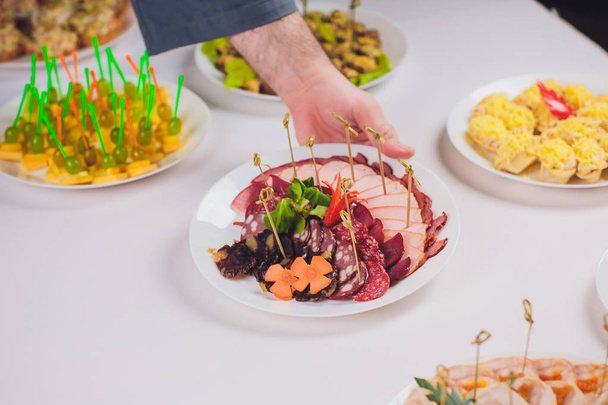 meat slicer hand catering service waiter cook - Valokuva, kuva