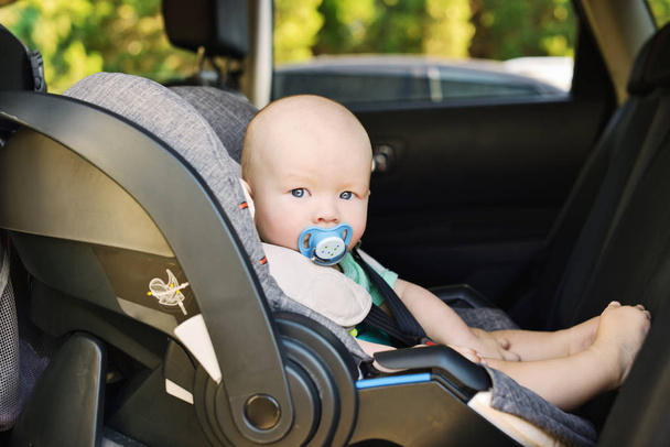 baby boy in the car seat in summer - Photo, Image