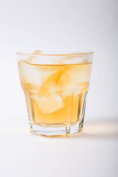 Alcohol cocktail glass on a white background - Fotoğraf, Görsel
