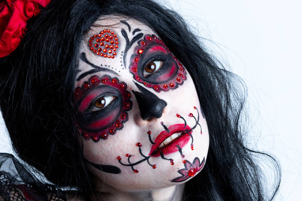 Make-up model with theme Mexican Day of the Dead in a study session in madrid, spain - Photo, Image