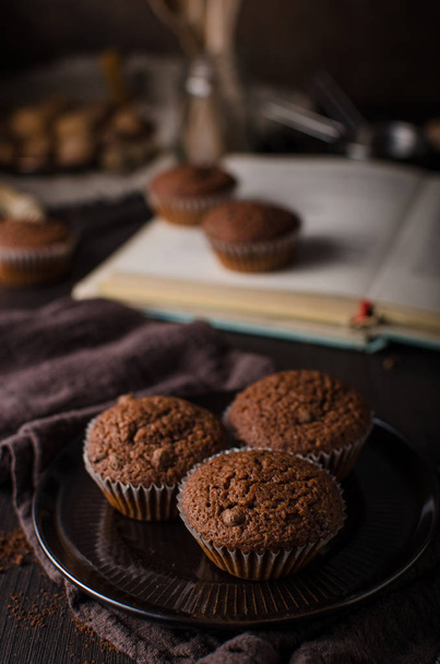 Homemade chocolate muffins with chocolate topping, delish and simple dessert - Foto, Imagem