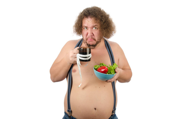 Dieta e stile di vita sano. Uomo grasso divertente. - Foto, immagini