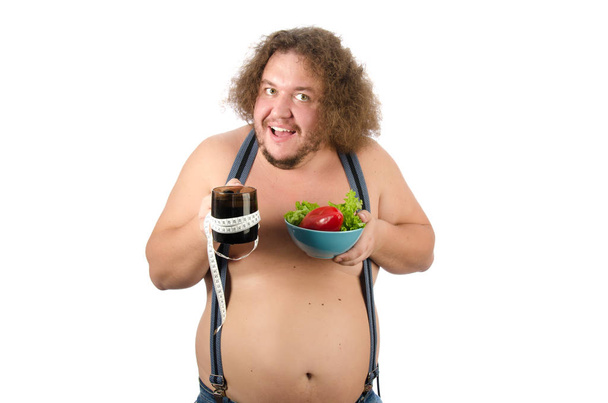 Dieet en gezonde levensstijl. Grappige dikke man.. - Foto, afbeelding