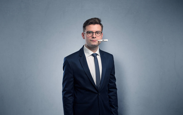 Businessman with thermometer and copy space - Fotoğraf, Görsel