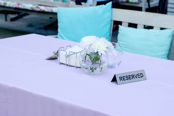 Reserved sign on a restaurant table - Photo, Image