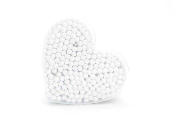Heart cotton buds on white background - Foto, imagen