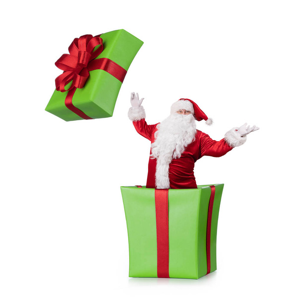 Szczęśliwy Samta Claus skoki z pudełka Boże Narodzenie na niebieskim tle z miejsca kopiowania tle  - Zdjęcie, obraz