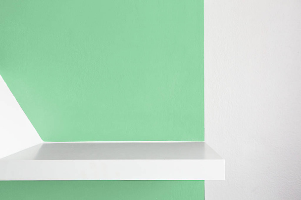 Empty white shelf, retail shelves from plywood frame. green color - Zdjęcie, obraz