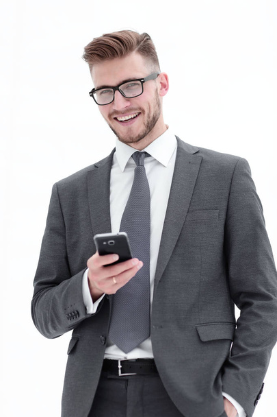 successful businessman with a smartphone. - Фото, зображення