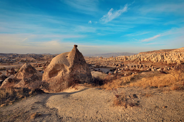 Rock formations in the Swords Valley close to the city of Goreme in Cappadocia, Turkey - Fotoğraf, Görsel