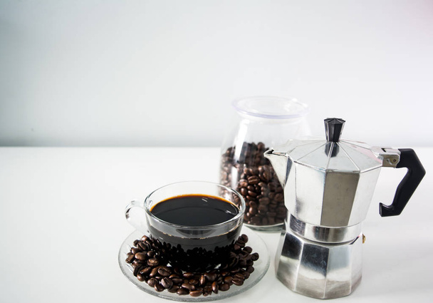 Coffee cup and moka pot, coffee bean, hot espresso one shot - Фото, изображение