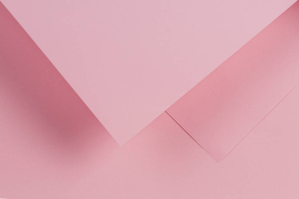 Abstract geometric shape pink color paper background - Photo, Image