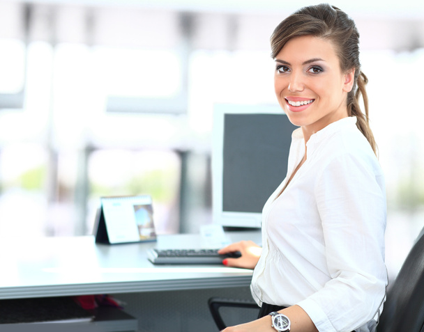 Modern business woman in the office - Photo, Image