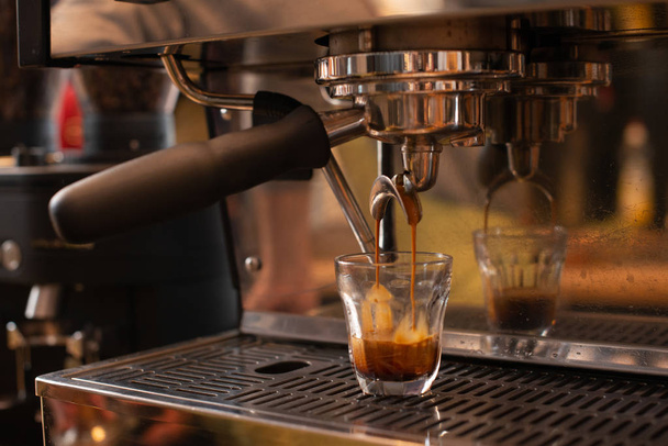 espresso machine pouring espresso, barista on work, cafe scene, making espresso - Photo, Image