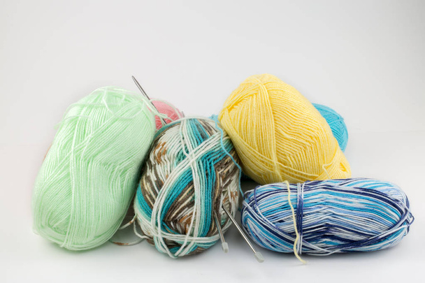 Close up shot of colored wool yarn balls as background - Φωτογραφία, εικόνα