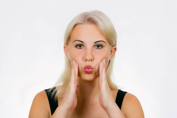 Exercice de visage pour les femmes joues plus pleines
 - Photo, image