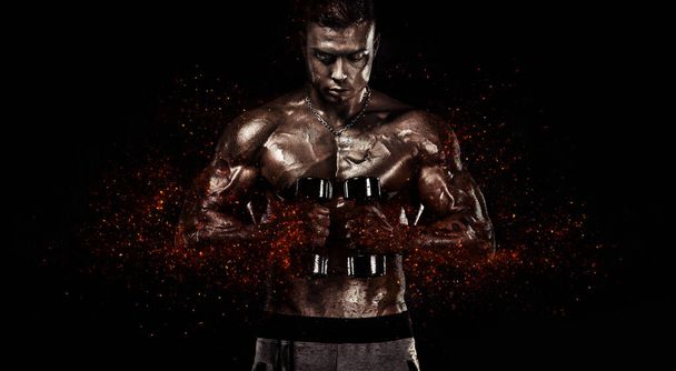 Muscular fitness sports man, atlete with dumbbell in fitness gym. Fire and power. - Foto, Imagem
