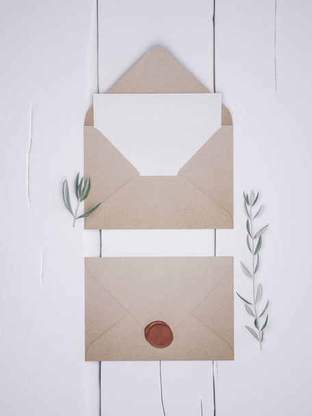 Envelope with an elegant wedding invitation. Place card mockup. - Photo, Image