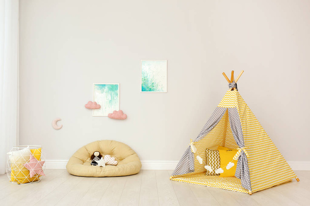 Modern nursery room interior with play tent for kids - Photo, image