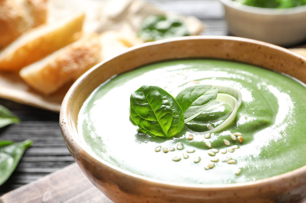 Fresh vegetable detox soup made of spinach in dish on table, closeup - Photo, Image