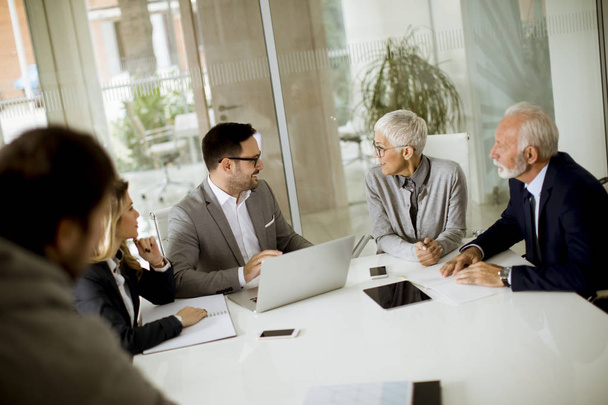 Group of businesspeople in conference room during a meeting in office - Photo, Image