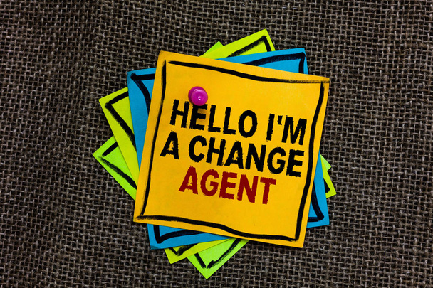 Text sign showing Hello I am A Change Agent. Conceptual photo Promoting and enabling difference evolution new Black bordered different color sticky note stick together with pin on jute sack. - Photo, Image