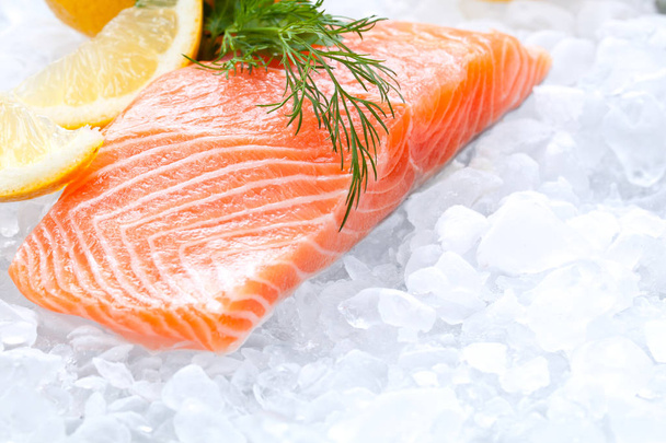 Fresh salmon on ice  - Фото, изображение