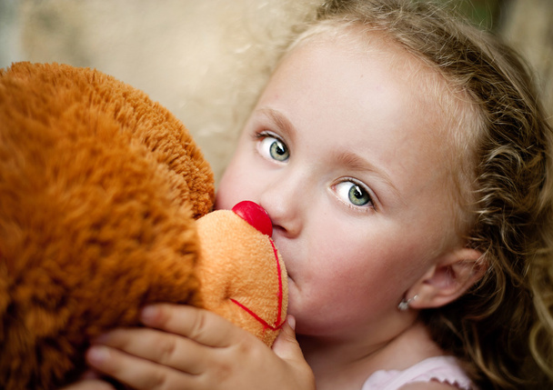 Girl with her teddy - Foto, imagen