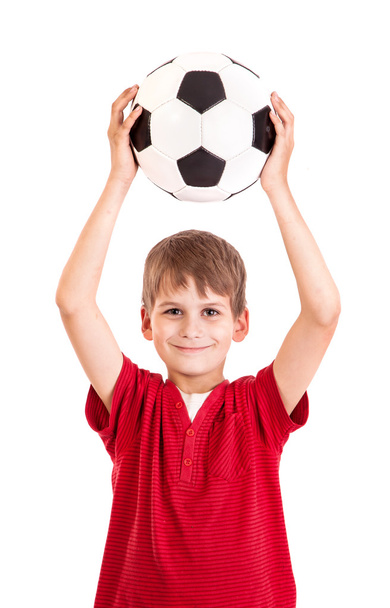 Cute boy is holding a football ball. Soccer ball - Foto, imagen
