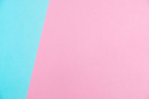 Pastel colored paper flat lay top view, background texture, pink and blue colour. - Foto, afbeelding