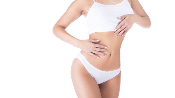 Kehonhoito. Kaunis nainen muodossa Fit hoikka elin, terve sileä pehmeä iho valkoisissa bikinit pikkuhousut
 - Valokuva, kuva