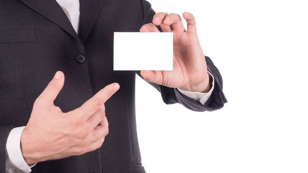businessman holding and showing empty business card or name card - business concept. - Photo, Image