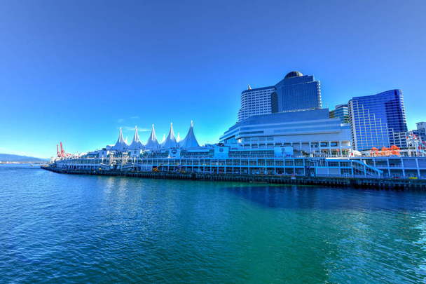 Canada Place and commercial buildings in Downtown Vancouver along Vancouver Harbour. - Photo, Image