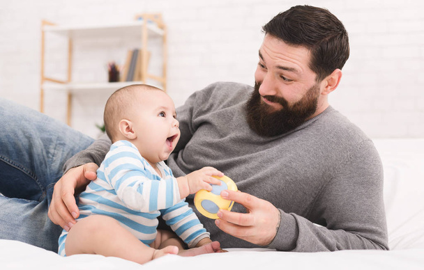 Happy father with his baby son at home - Photo, Image