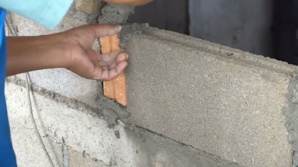 Bricklayer Mason or Building Room by Mortar or Cement. Semener is creating wall or room by brick. 4k 3840x2160 High resolution footage for industrial category - Footage, Video