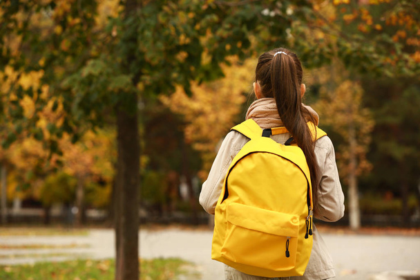 Cute girl with backpack going to school - Foto, imagen