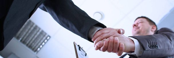 Man in suit shake hand as hello in office - Photo, Image