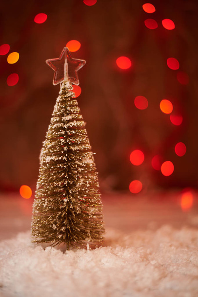 close up view of christmas tree decorated by beautiful star  - Zdjęcie, obraz