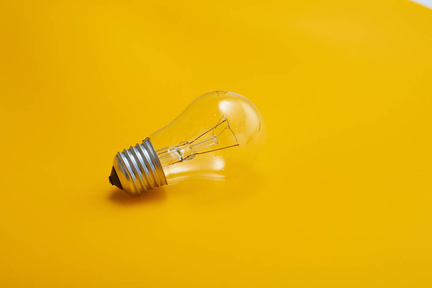 minimalistic wallpaper, light bulb and copy space - Фото, изображение